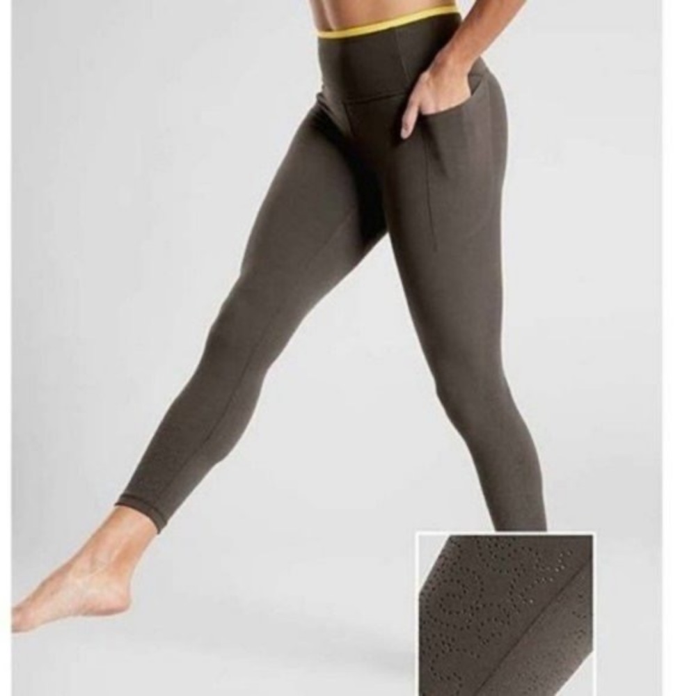 Athleta Revelation Laser Cut 7/8 Tight In Powervita with Pocket in Olive, Size M